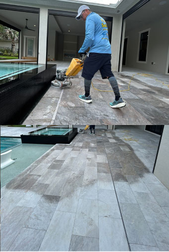 Clean Image technician cleaning a pool deck with hot-water vacuum recovery equipment